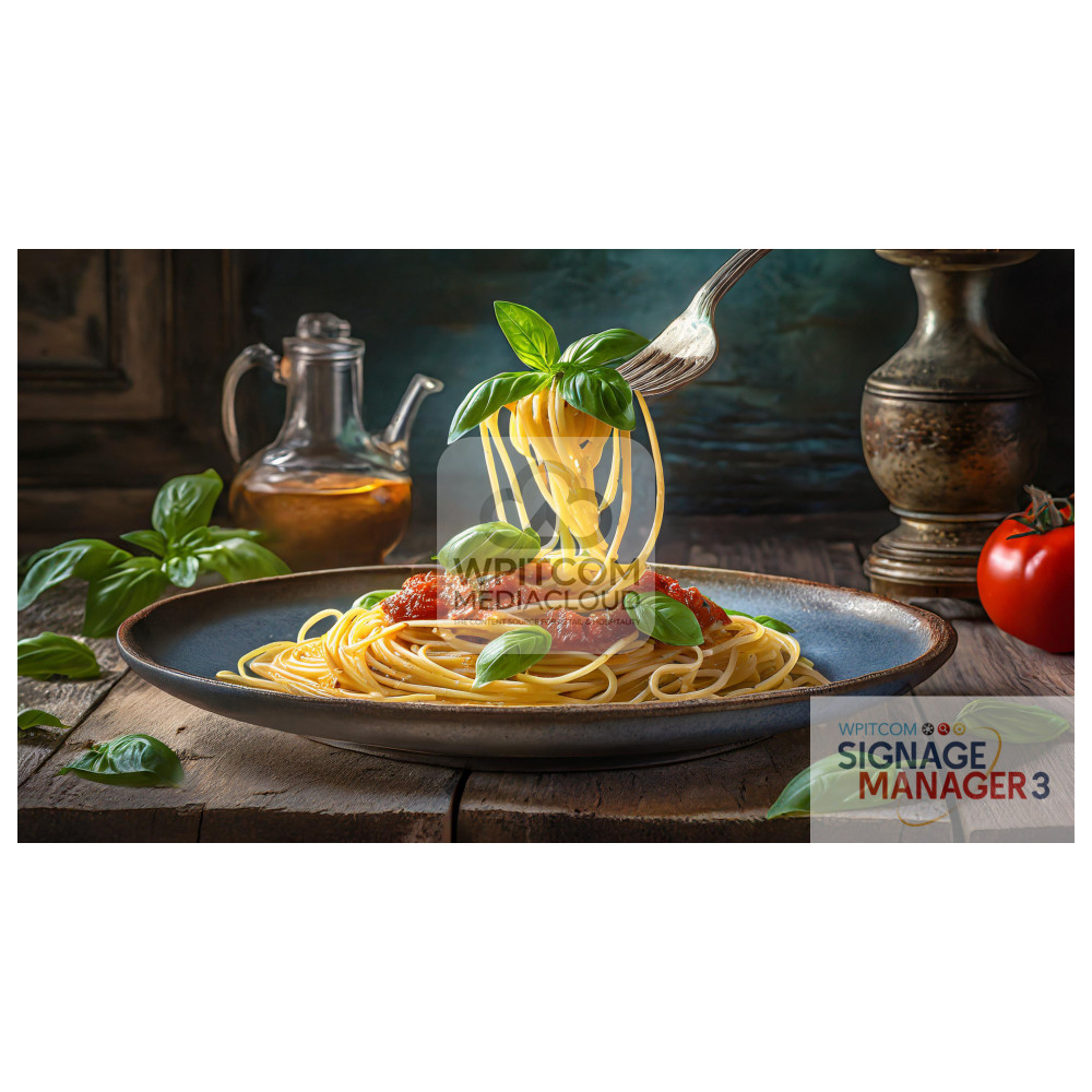 A plate of spaghetti with basil