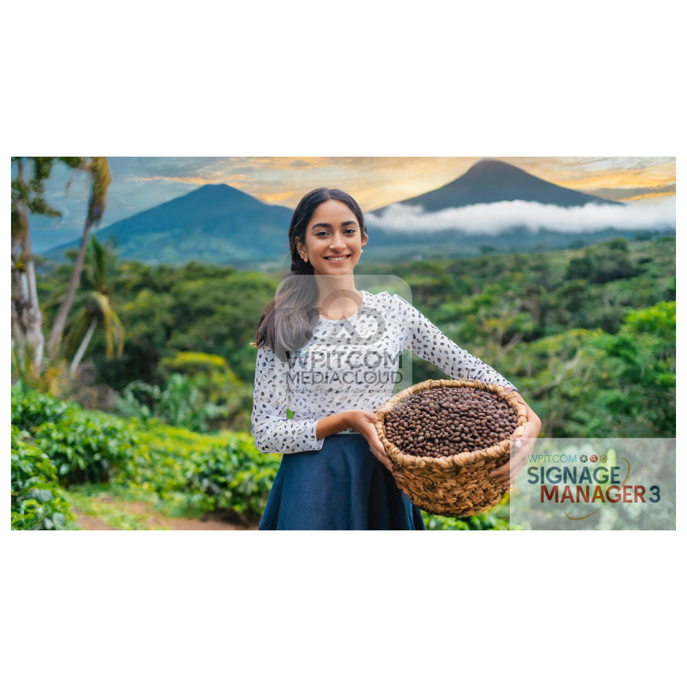 A youg lady presenting roasted coffee in the hgihlands