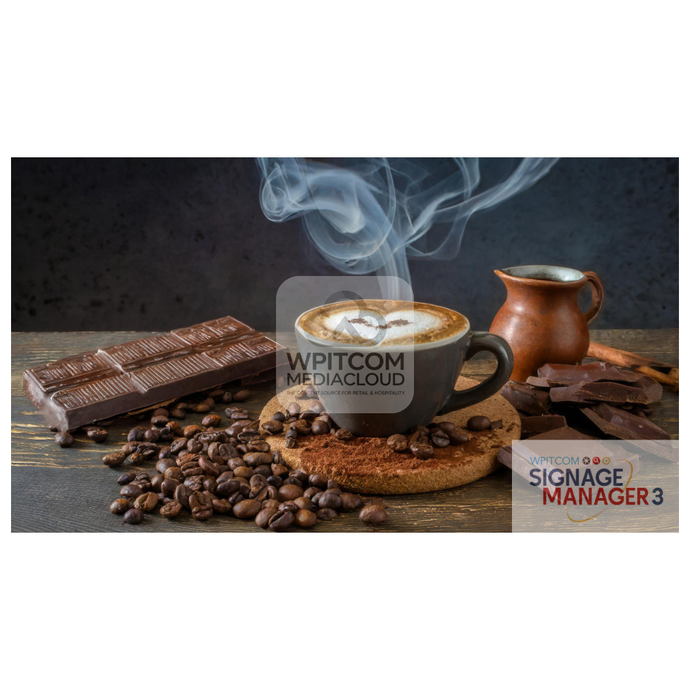 A steaming coffee cup with coffee beans and cinnamon and chocolate