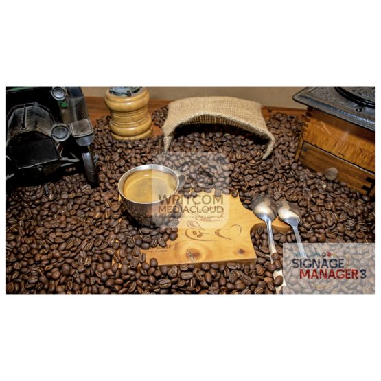 A cup of espresso coffee on a table with beans